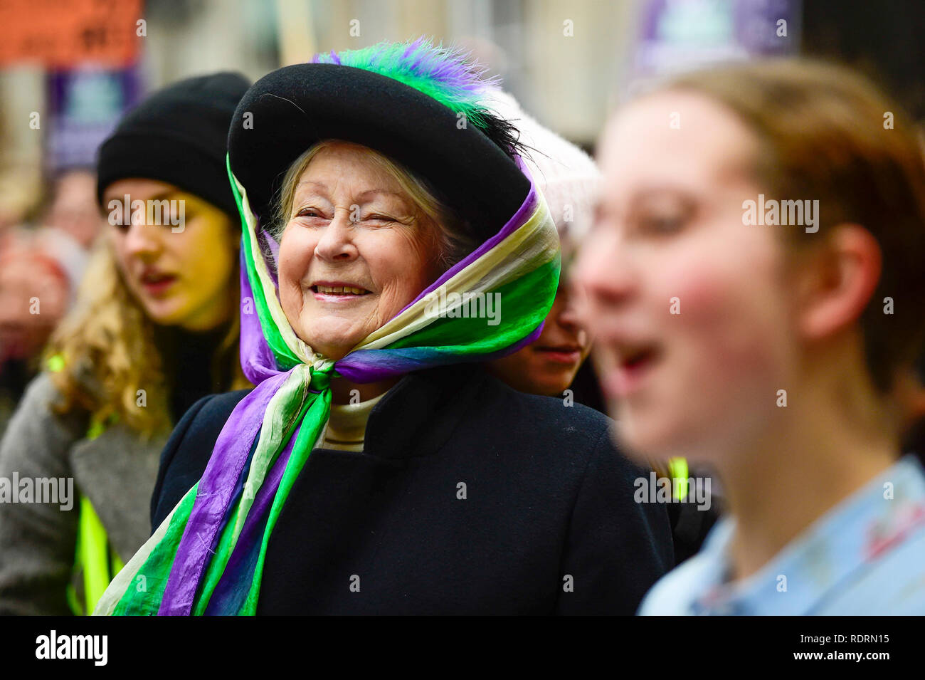 London, UK. 19th Jan, 2019. A woman dressed as a suffragette during the Women's March in the capital, one of 30 such worldwide marches protesting against violence against women and the negative impact of austerity policies. London's theme this year is 'Bread and Roses', honouring Polish-American suffragette Rose Schneiderman who, in 1911 said 'The worker must have bread but she must have roses too', in response to a factory fire where 146 mainly female garment workers died. Credit: Stephen Chung/Alamy Live News Stock Photo