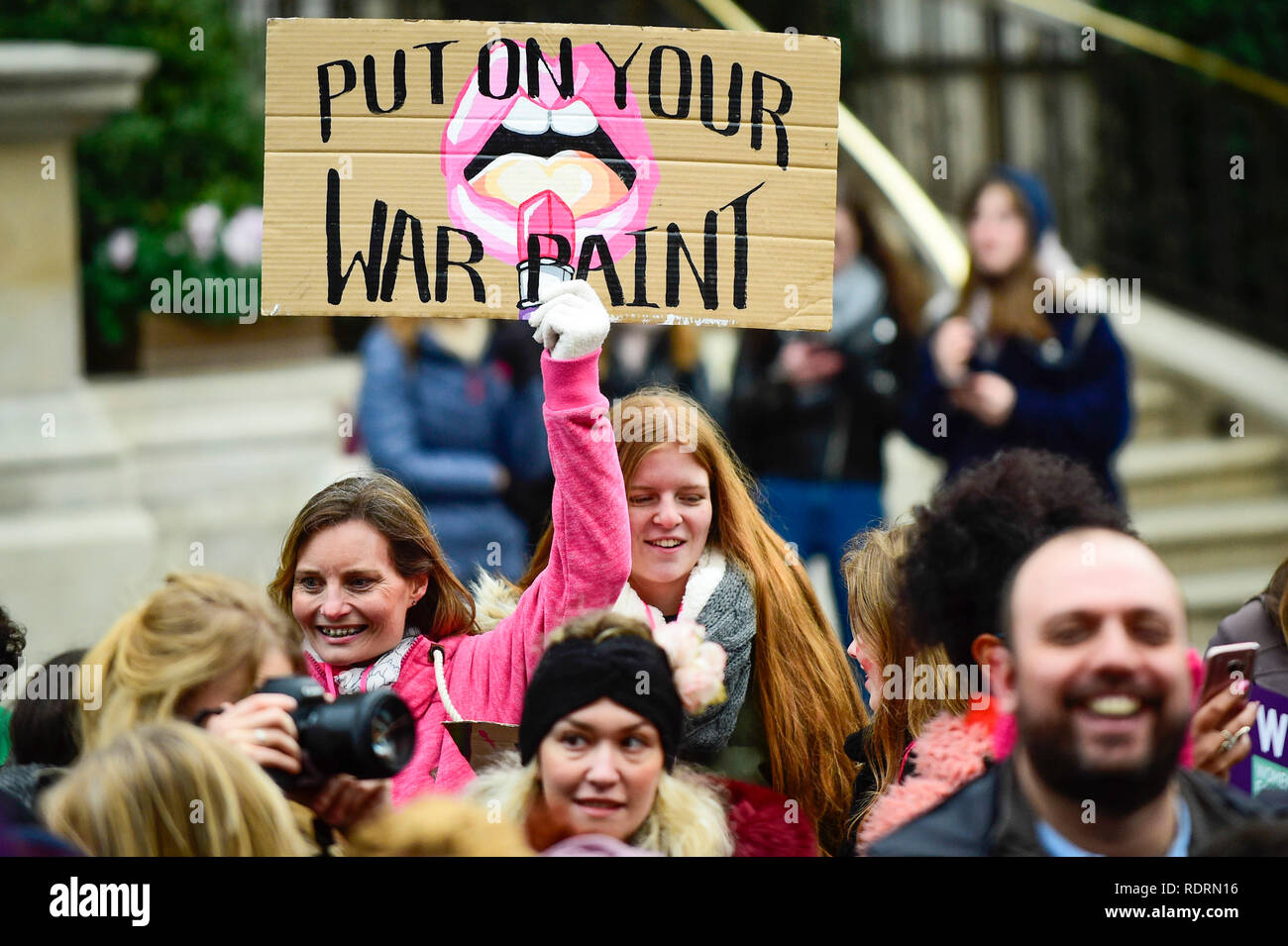 London, UK. 19th Jan, 2019. A girl carries a sign during the Women's March in the capital, one of 30 such worldwide marches protesting against violence against women and the negative impact of austerity policies. London's theme this year is 'Bread and Roses', honouring Polish-American suffragette Rose Schneiderman who, in 1911 said 'The worker must have bread but she must have roses too', in response to a factory fire where 146 mainly female garment workers died. Credit: Stephen Chung/Alamy Live News Stock Photo