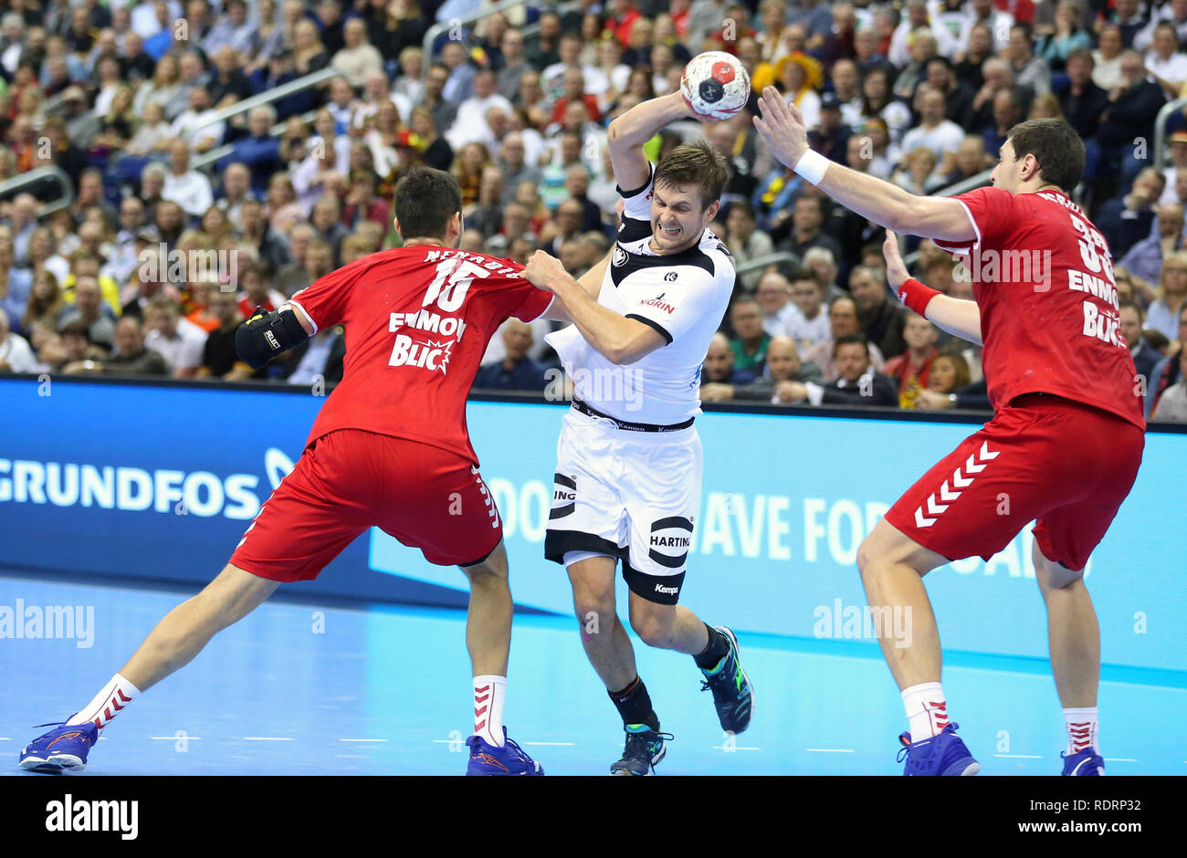 Germany. Germany, 19th January 2019. Fabian Bohm (38) for Germany attempts to get past Drasko Nenadic (15) and Mijajlo Marsenic (33) for Serbia Credit: Mickael Chavet/Alamy Live News Stock Photo
