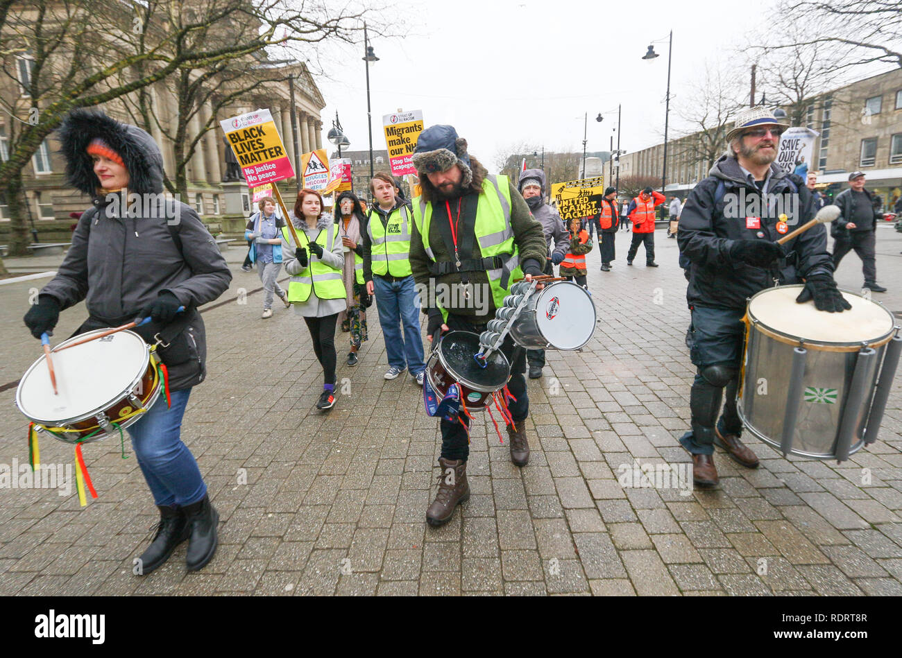 Bolton, UK. 19 January 2019. Bolton, Lancashire, UK. The Bolton Yellow Vest Protest saw a crowds f people in high-visibility jackets gather at 12.30pm on Saturday, January 19, in Victoria Square in front of the Town Hall in association with other rallies organised by The People's Assembly.  Leila Hassan and Sasha Roper are part of Stand Up To Racism Bolton, the group which is organising the rally. They take inspiration from the 'yellow vest' protests in France which have seen hundreds of thousands of people march against austerity policies in Paris.   Credit: Phil Taylor/Alamy Live News Stock Photo