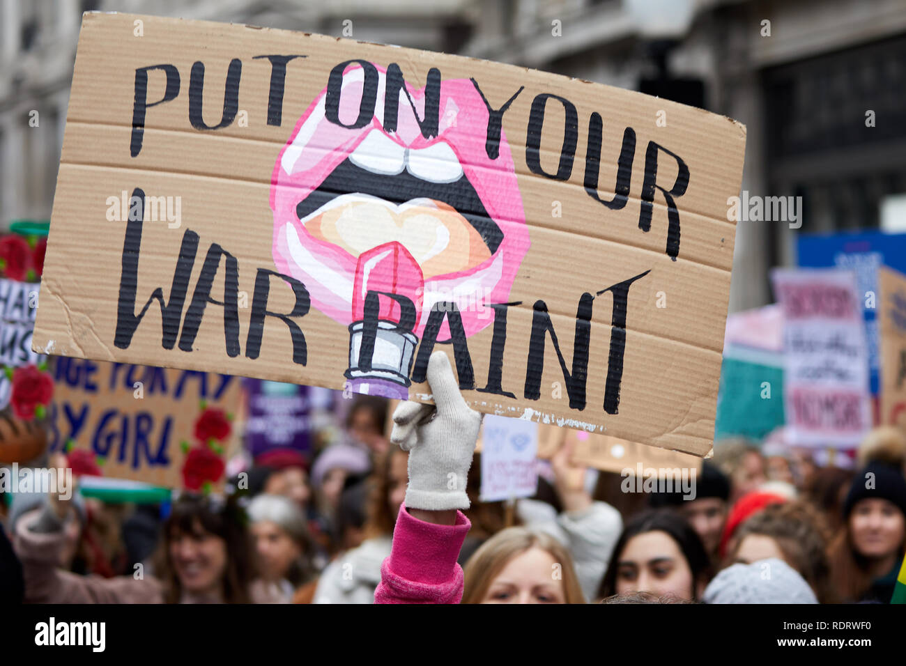 London, UK. - Jan 19, 2019: A placard displayed by a protestor during the Bread and Roses women’s march through London. Stock Photo