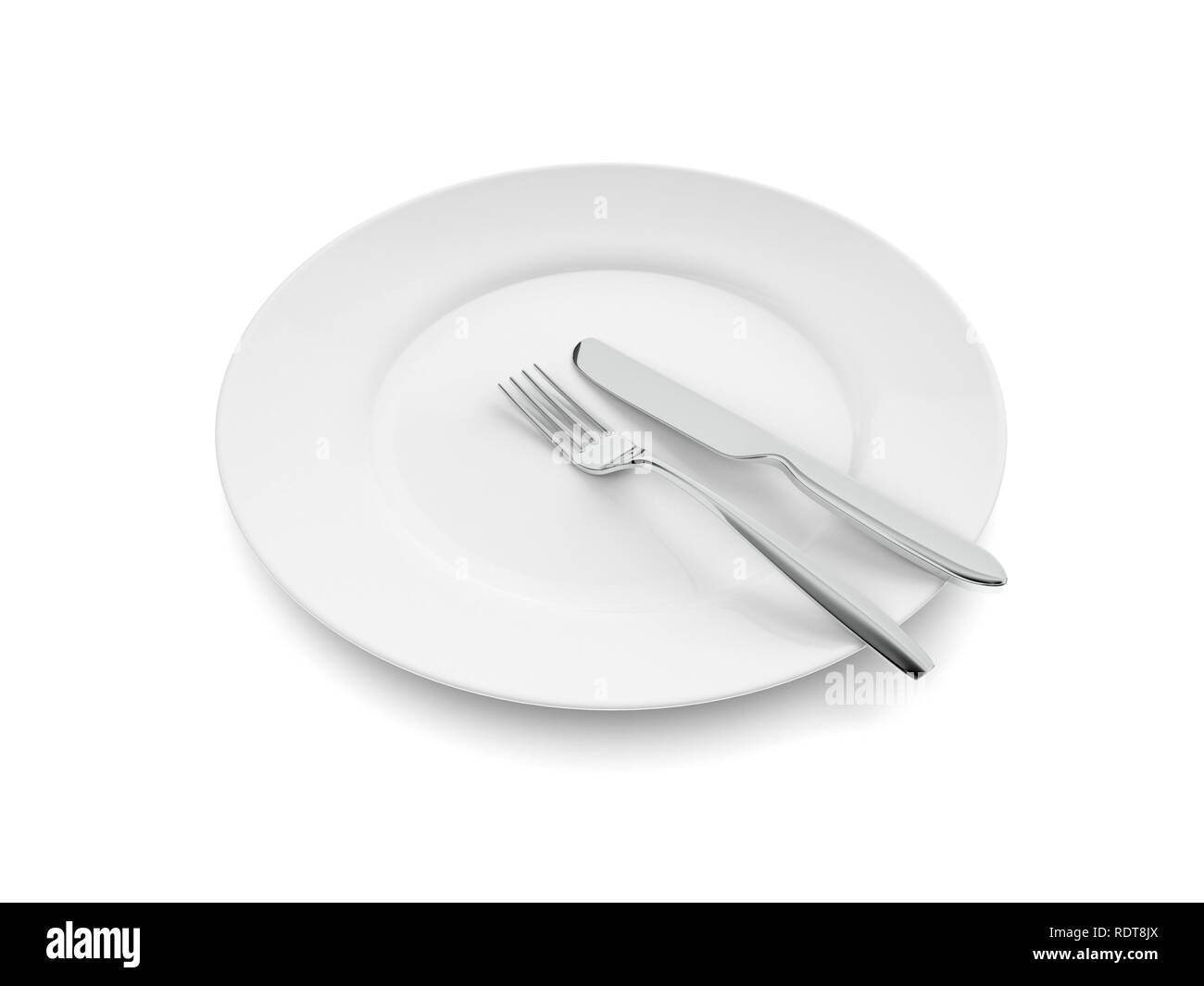 Empty dinner plate, knife and fork Stock Photo