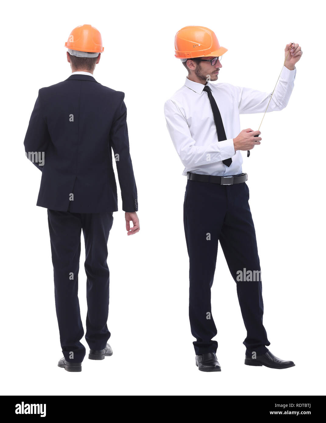 in full growth .successful architect engineer in orange helmet. photo ...