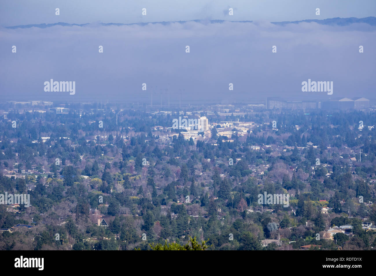 Aerial view of Mountain View and Los Altos covered by a layer of ...