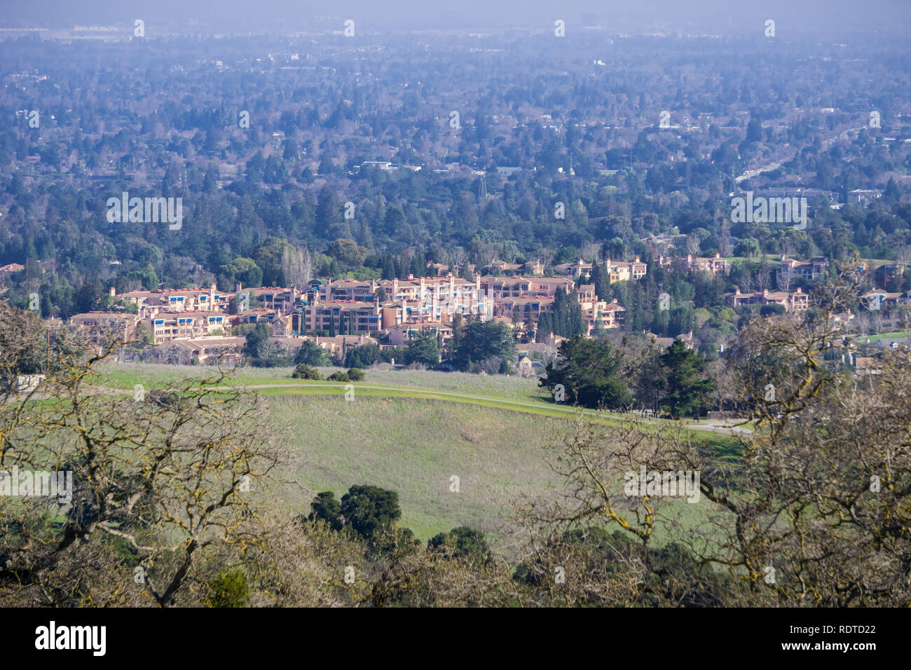 Aerial view of condominium buildings surrounded by green areas, Cupertino, south San Francisco
