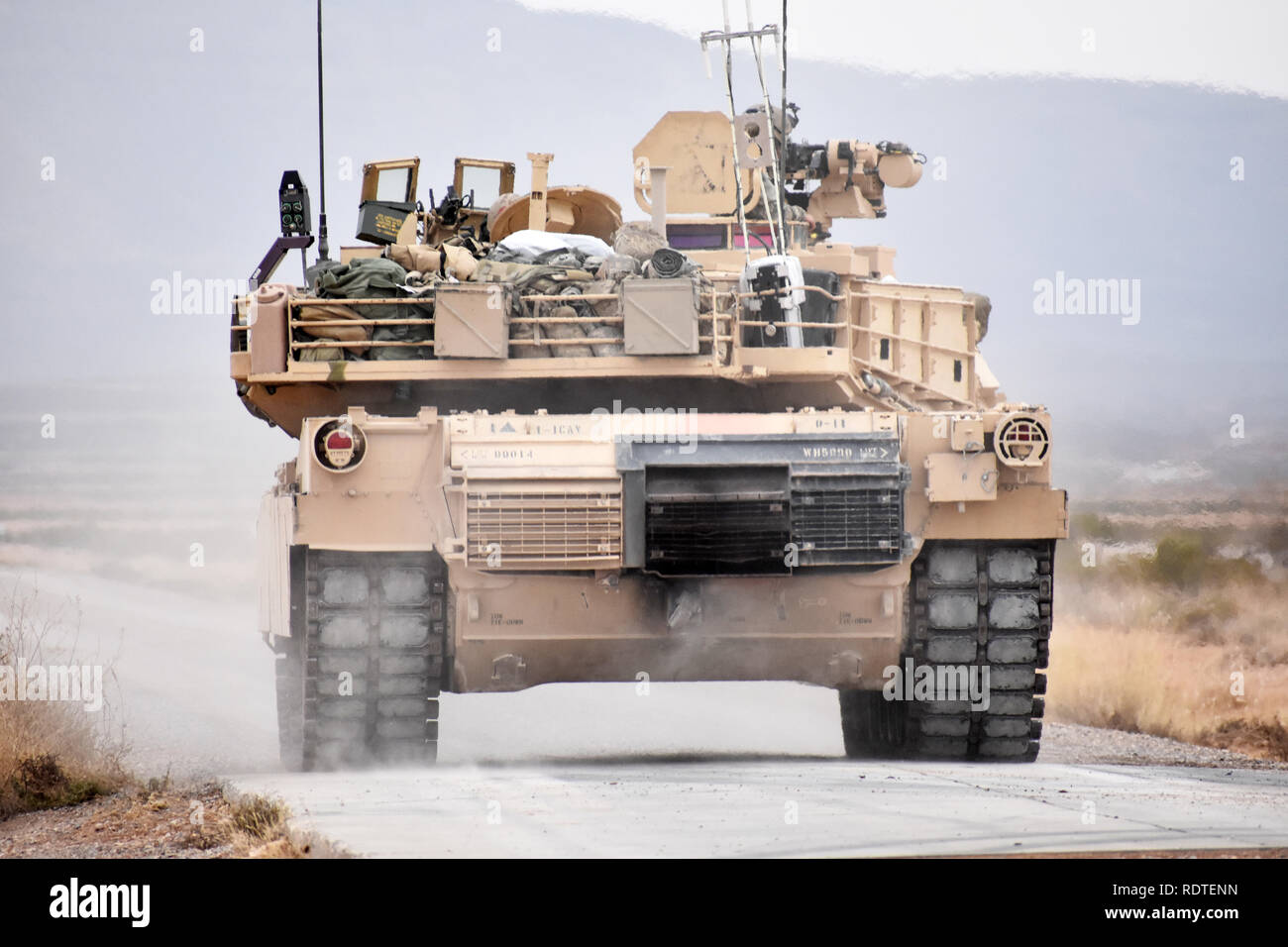 Soldiers assigned to Company D, 1st Squadron, 1st Cavalry Regiment, 2nd Armored Brigade Combat Team, 1st Armored Division, participate in a gunnery at Fort Bliss Dec. 7, 2018, that helped evaluators test the Trophy Active Protection System for tanks. These M1A2 SEPv2 Abrams tanks were not equipped with the system, but served as a baseline against which testers could compare tanks equipped with the system. Stock Photo