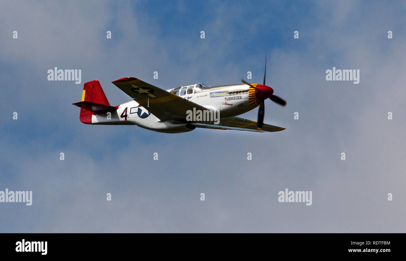North American P-51 Mustang, the Red tail of the Tuskegee Airmen flying in air show Stock Photo