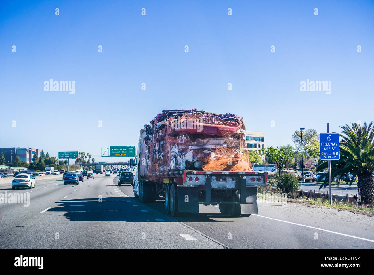 Truck carrying crushed car bodies for recycling, San Francisco bay area, California Stock Photo