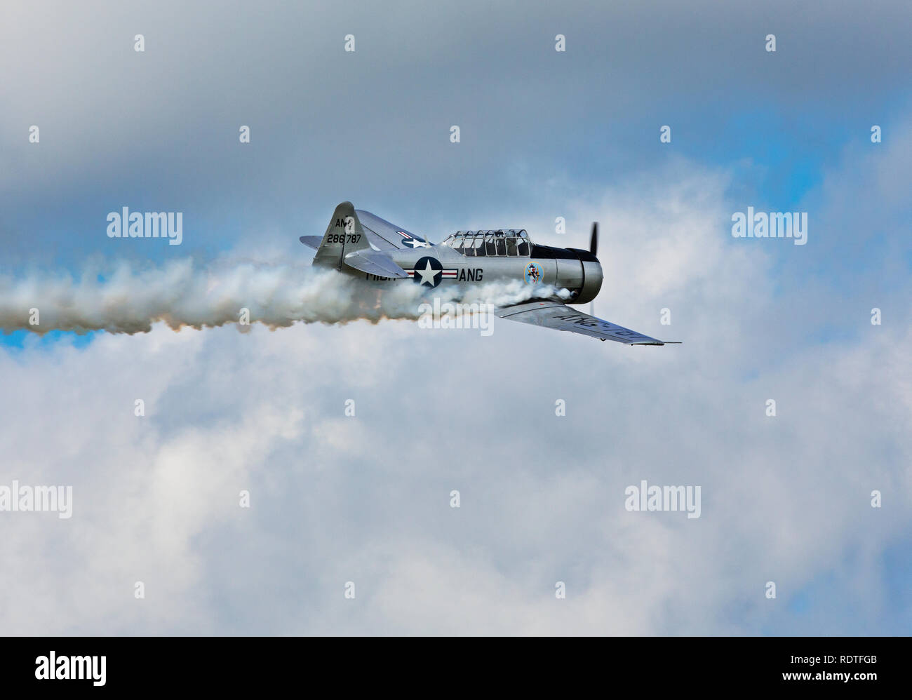 North American T-6 Texan trainer from World War II Flying in air show Stock Photo