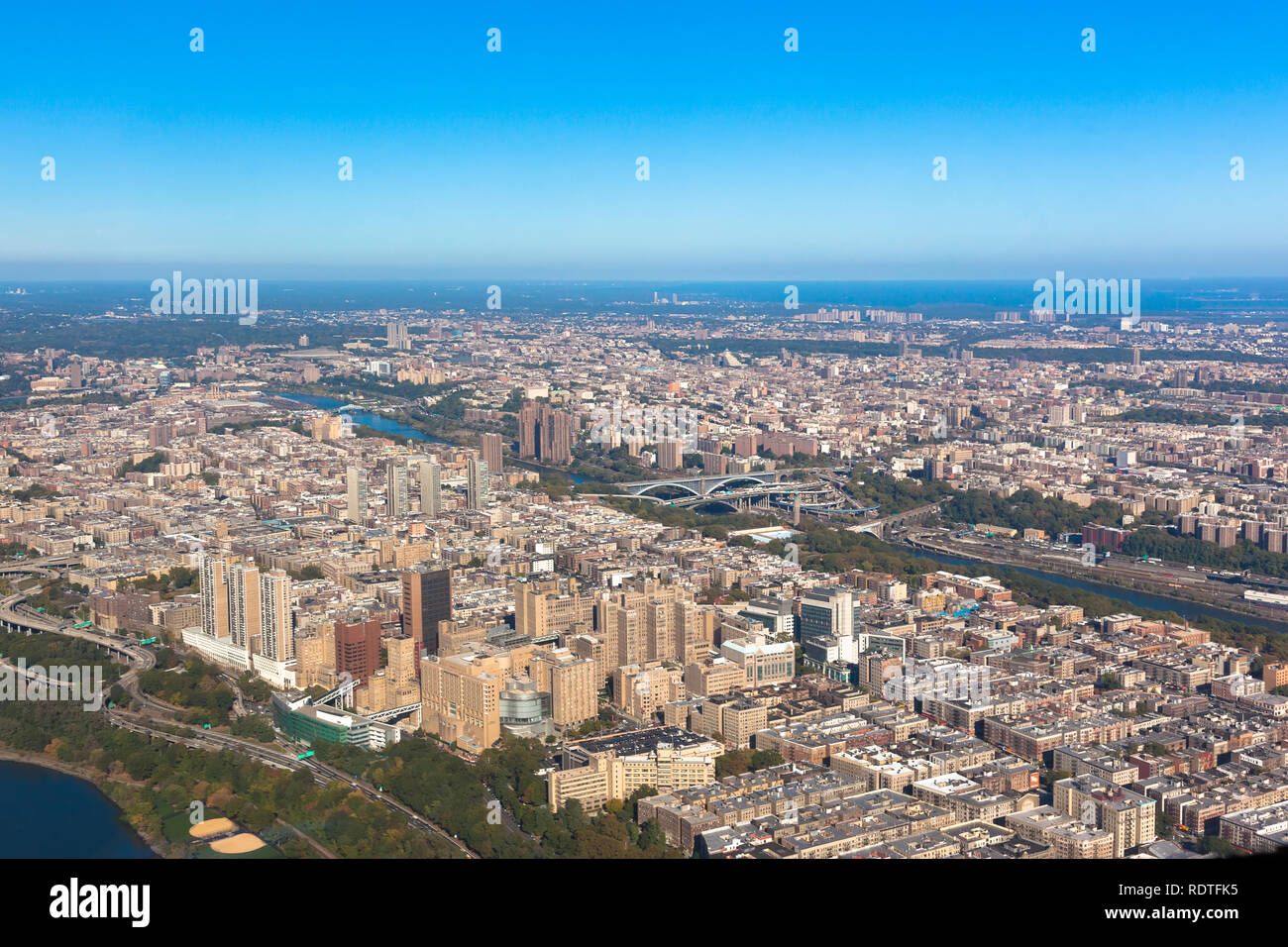 Washington heights in New York. Aerial helicopter view.  Upper Manhattan. Houses between Harlem river and Hudson bay Stock Photo