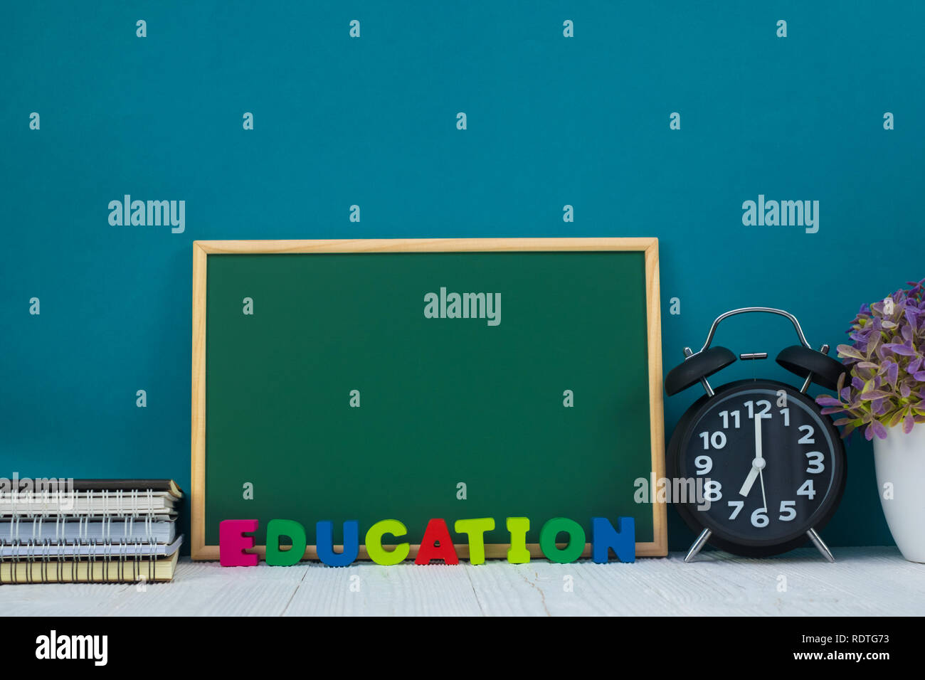 Back to school concept idea, Education text and green chalkboard with ...