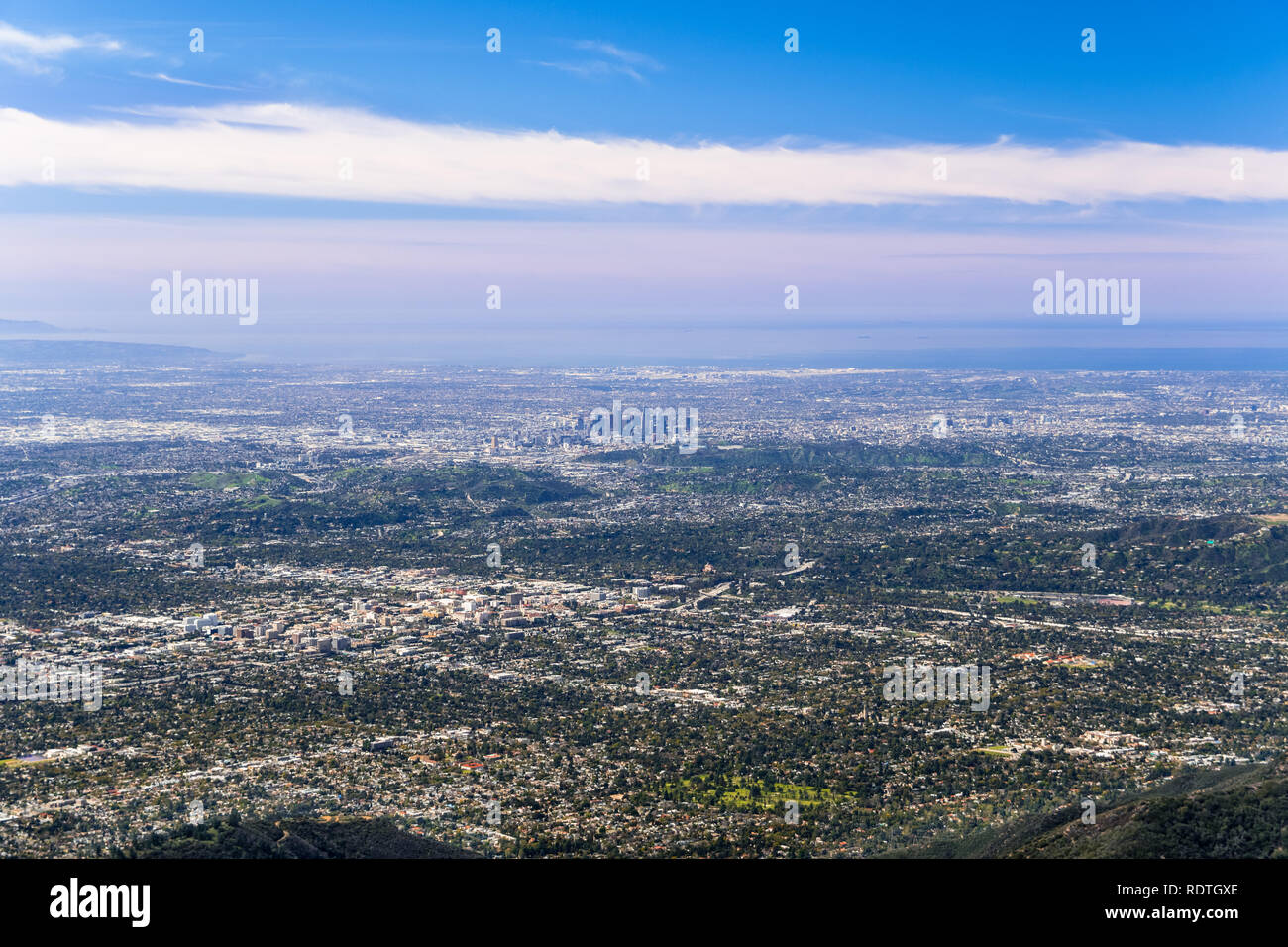 Panoramic aerial view of Los Angeles downtown and the metropolitan area surrounding it; Pasadena in the foreground; Santa Monica and the Pacific Ocean Stock Photo