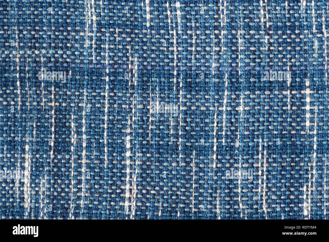 Handmade cotton woven fabric as a background and texture Stock Photo