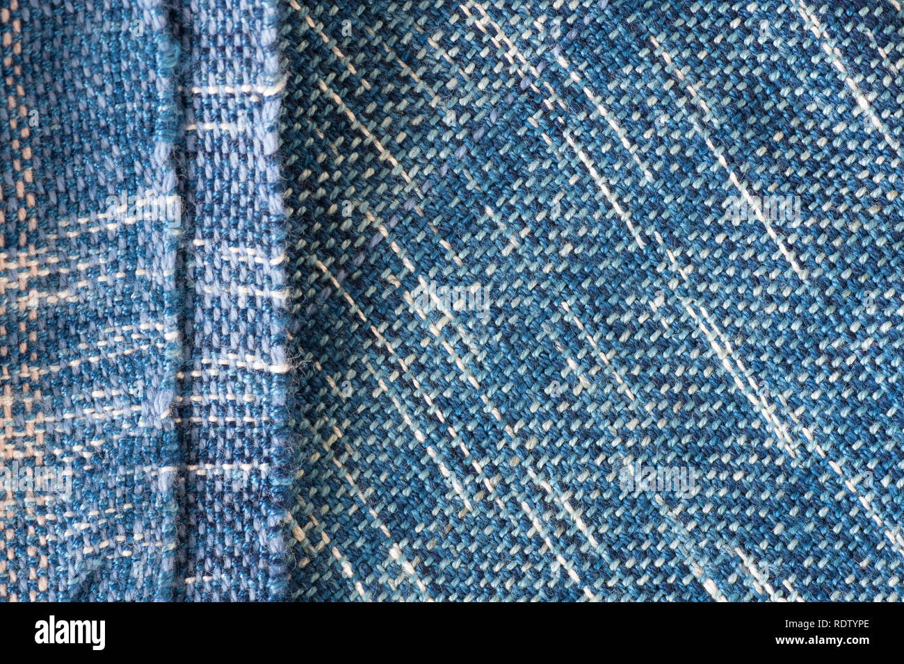 Handmade cotton woven fabric as a background and texture Stock Photo