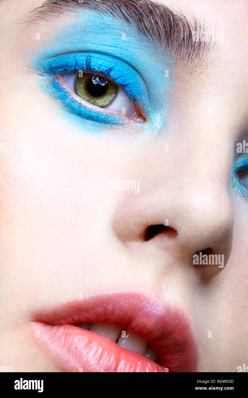 Closeup macro portrait of female face. Human woman half-face with ...