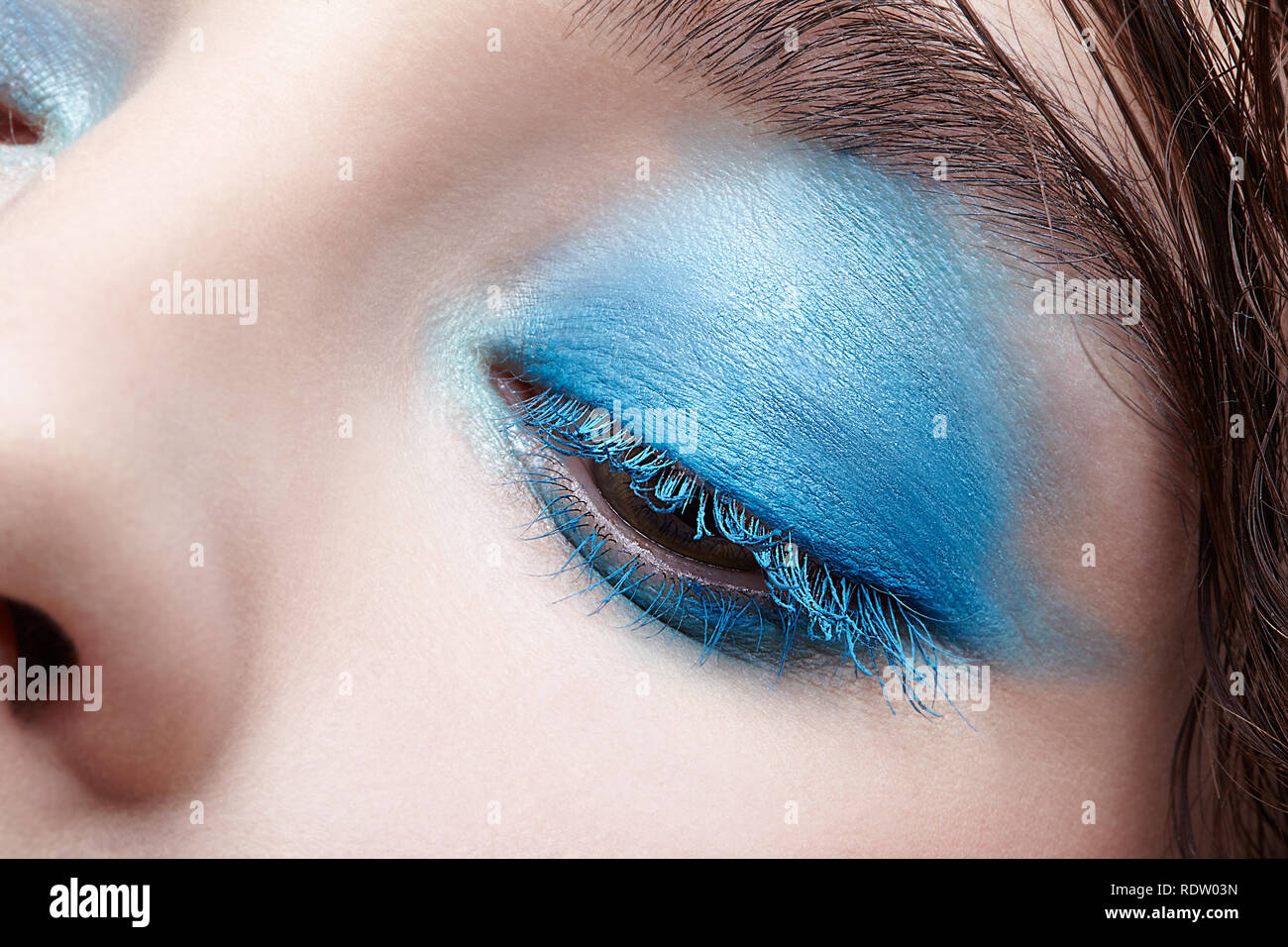Closeup macro portrait of human female eye. Woman with unusual evening ...