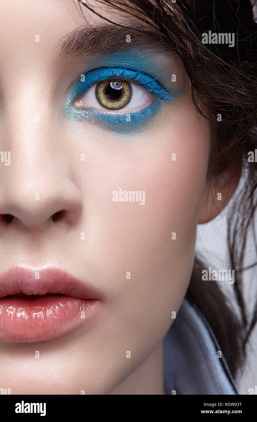 Closeup macro portrait of female face. Human woman half-face with ...