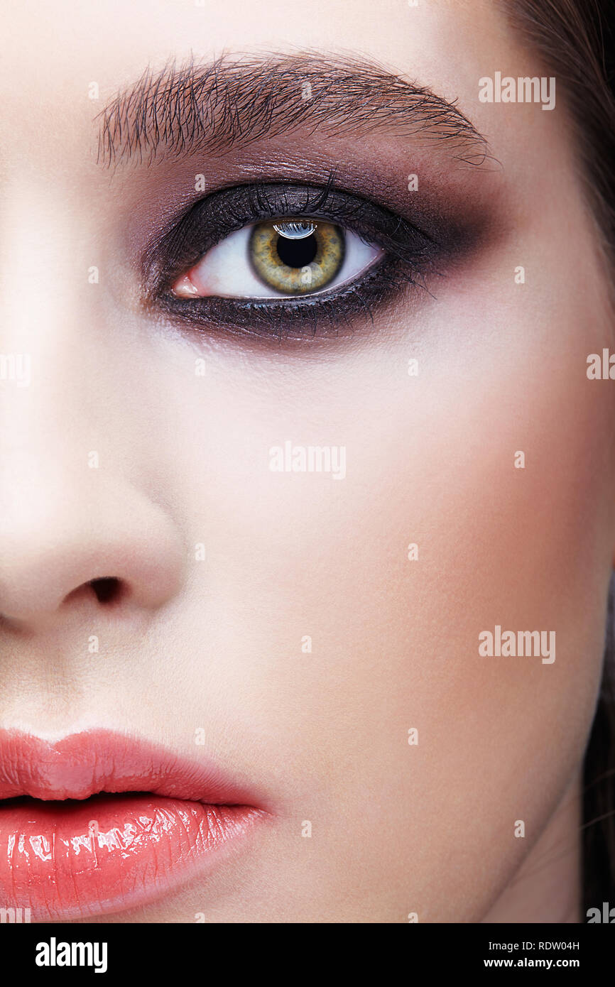 Closeup macro portrait of female face. Woman with unusual evening ...