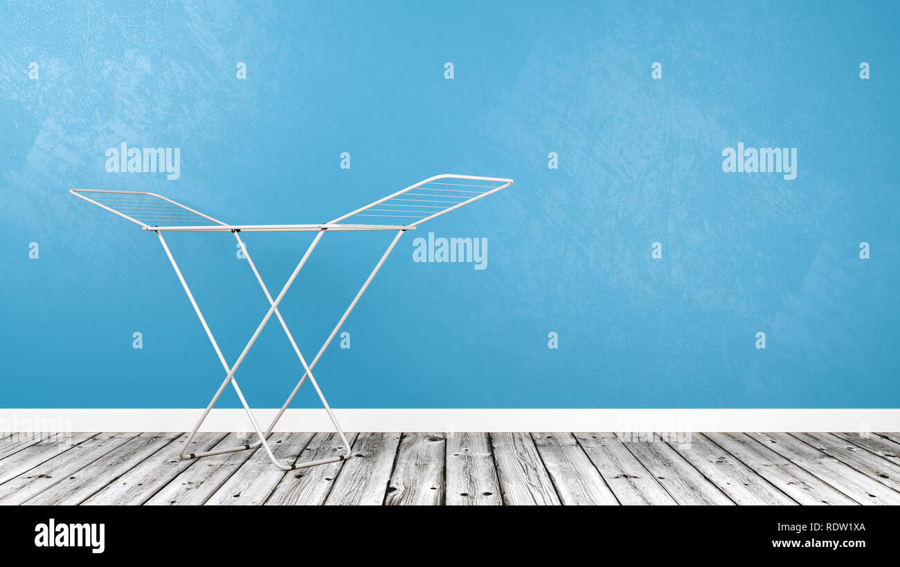 White Clothes Drying Rack on Wooden Floor Against Blue Wall with Copy Space 3D Illustration Stock Photo
