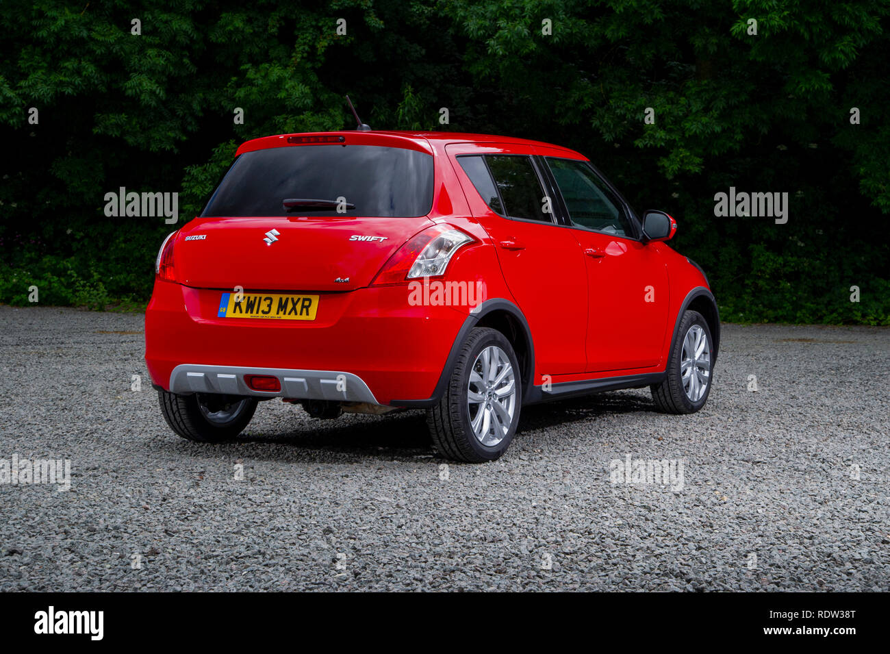 2013 Suzuki Swift 4x4 - 4 wheel drive compact car Stock Photo - Alamy