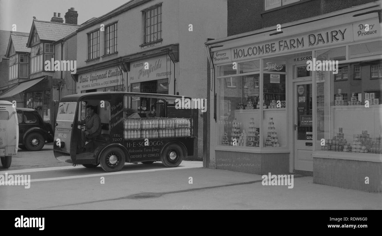 1950s, Oxford, H. E Scroggs, milk float outside the grocery shop of