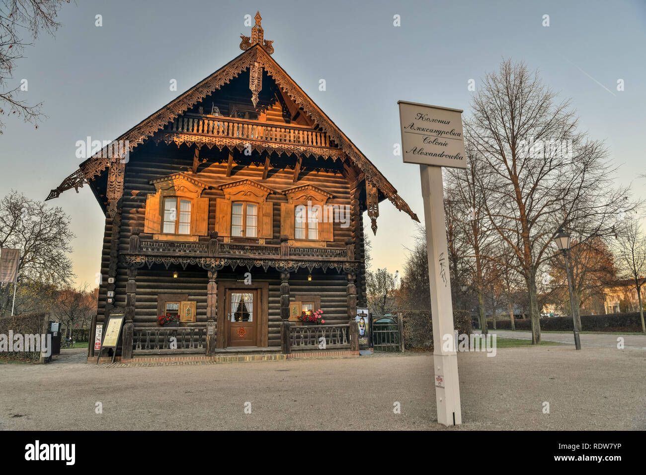 Potsdam, Germany - November 16, 2018. Timber house and Russian colony Alexandrowka sign in Russian neighbourhood Alexandrowka in Potsdam. Stock Photo
