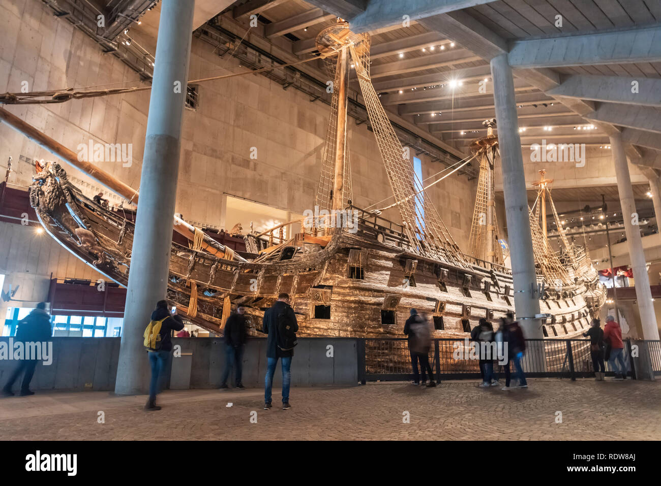 Stockholm, Sweden - November 18, 2018. Interior view of Vasa Museum in Stockholm, with 17th century warship Vasa and people. Stock Photo