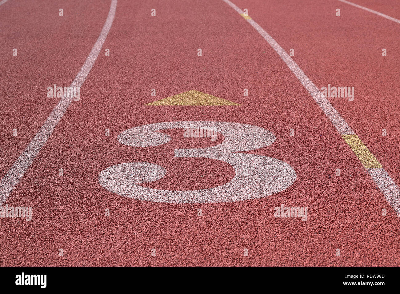 Track and Field Race Course Lane 3 Stock Photo