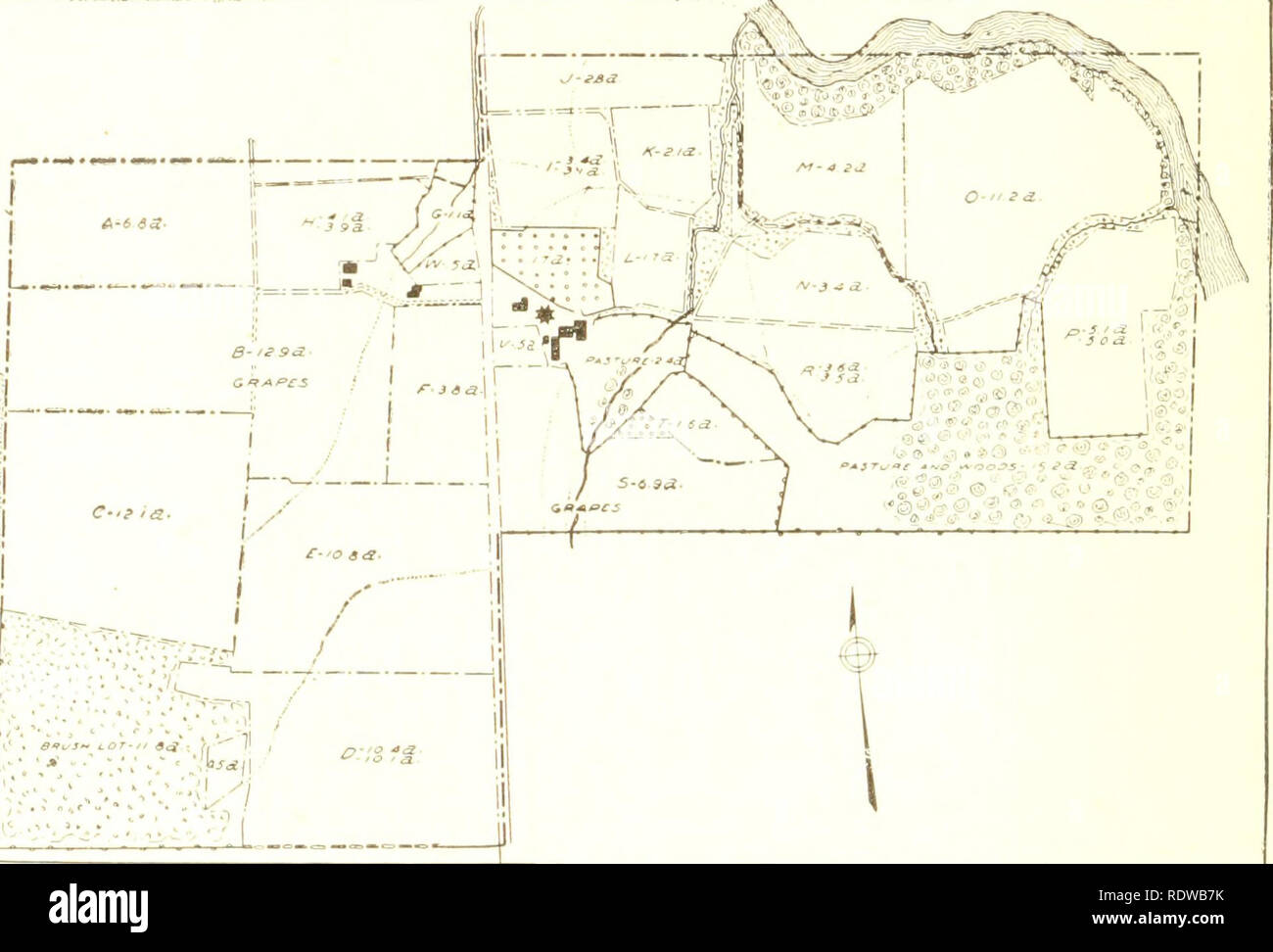 . An economic study of farm layout ... Farm buildings; Agriculture. 454 W. 1. Myers Frequently the possible saving- of land and labor justifies the elimina- tion of these obstructions to cultivation. An improvement of this kind is shown in figures 115 and 11(3. Plan I in figure 115 shows the laj^out of 50 acres which form part of a farm of 160 acres. The open ditch shown in this plan divided this area, as indicated, into irregular fields. With all. 1 -. ^, -T;. y / j i Â«.â , .1,7 Â»*â â¢e ' :â¢' â ;' -^i â'Â» â¢V / '. â¢'1 Fig. 113. a westeen new york farm having many fields of irregular sha Stock Photo