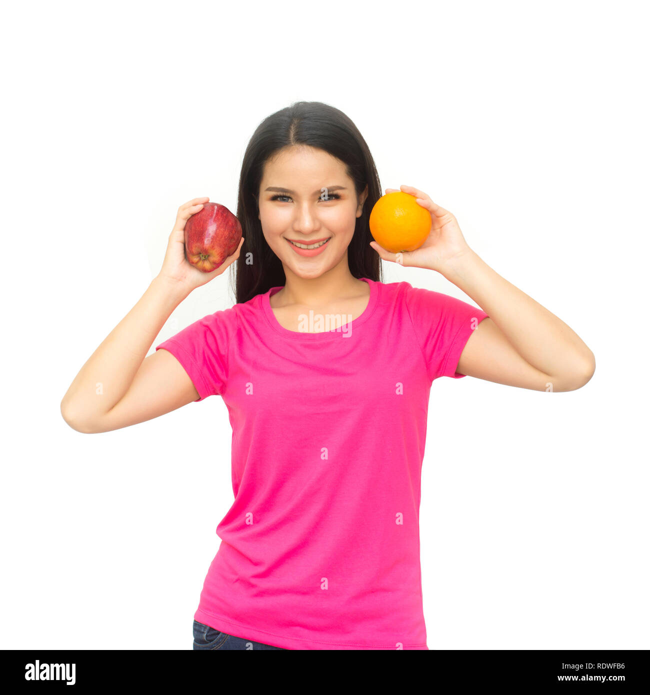 Health girl show red apple and orange with smile face isolated on white background, healthy eating food concept Stock Photo