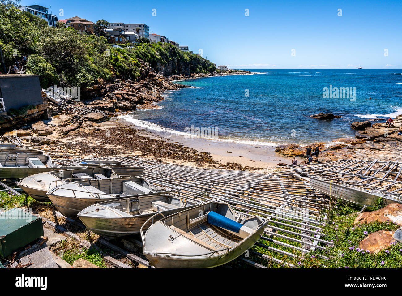 Gordon's Bay view with small boats on the shore during Bondi to Coogee coastal walk in Sydney NSW Australia Stock Photo