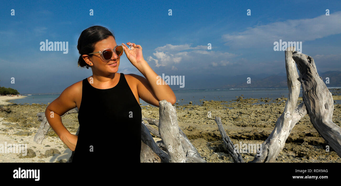 Woman young posing at on the beach hi-res stock photography and images ...