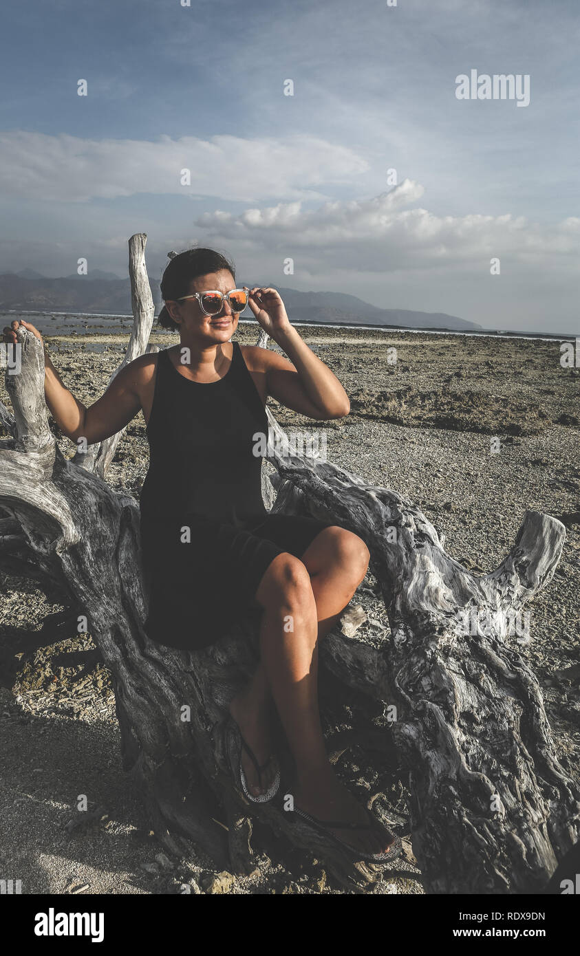Woman young posing at on the beach hi-res stock photography and images ...