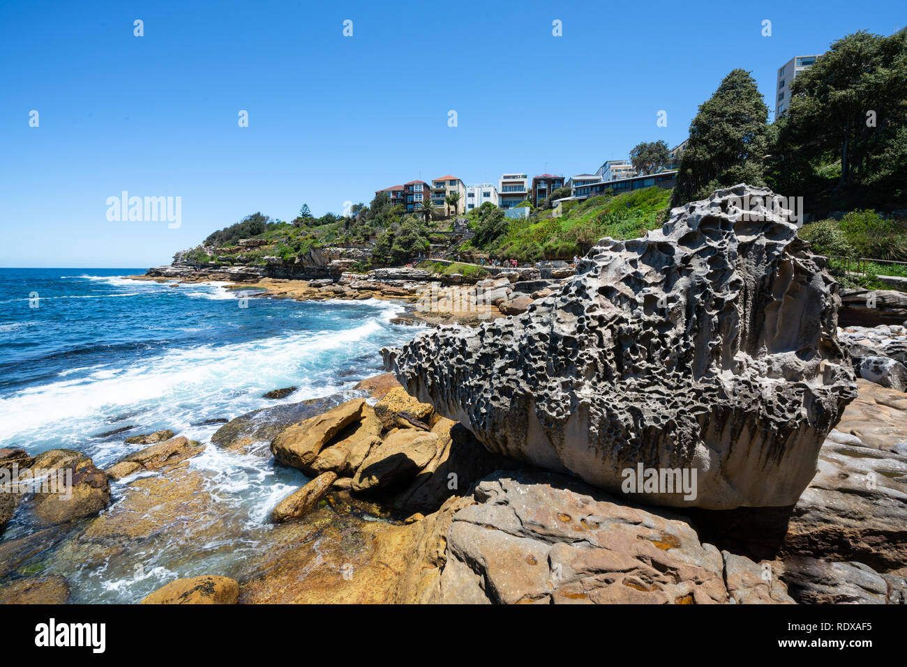 Huge rock on seashore during Bondi to Bronte coastal walk in Sydney NSW Australia Stock Photo