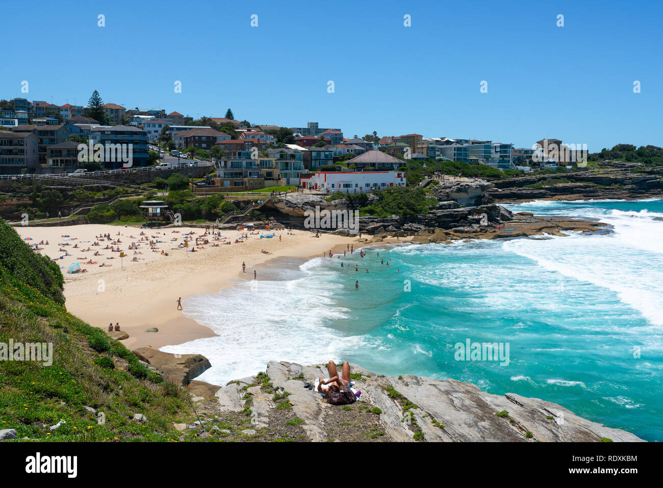 Distant view of full of people Tamarama beach in Sydney NSW Australia Stock Photo