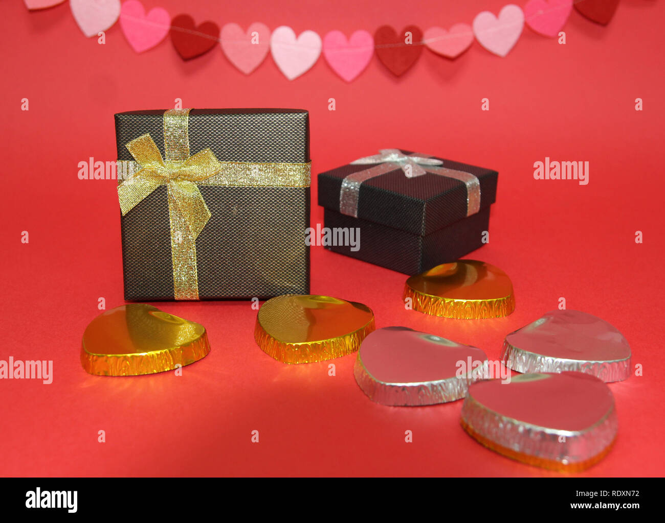 Gift box with red theme Stock Photo Alamy