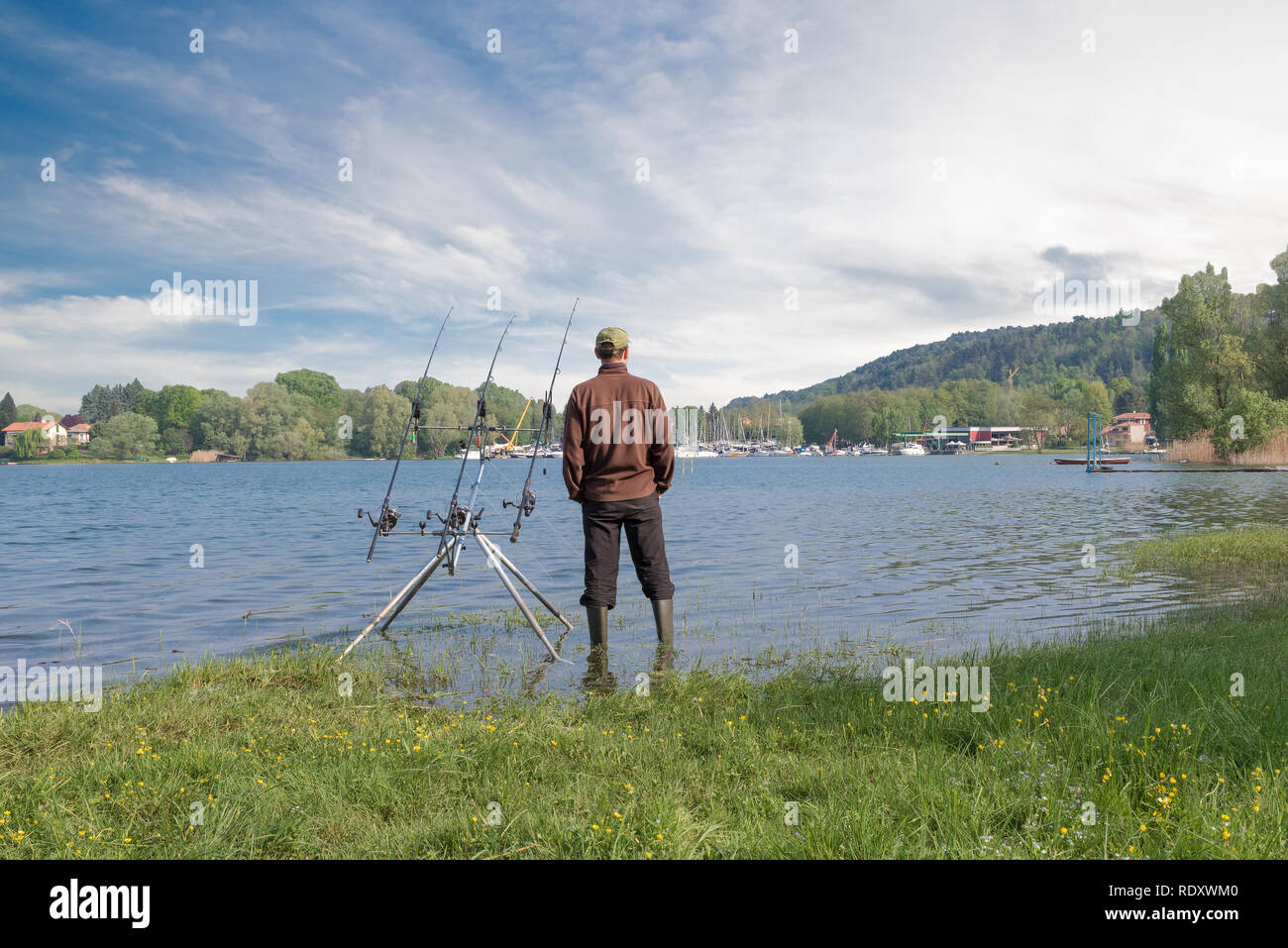 Fishing adventures. Angler is fishing with carp fishing technique Stock Photo