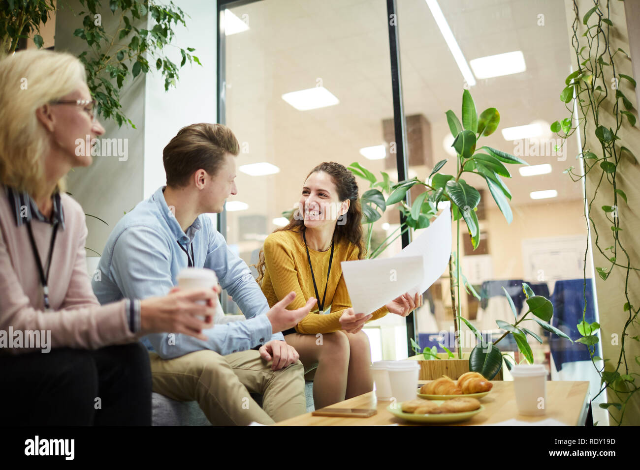 Colleagues discussing papers Stock Photo