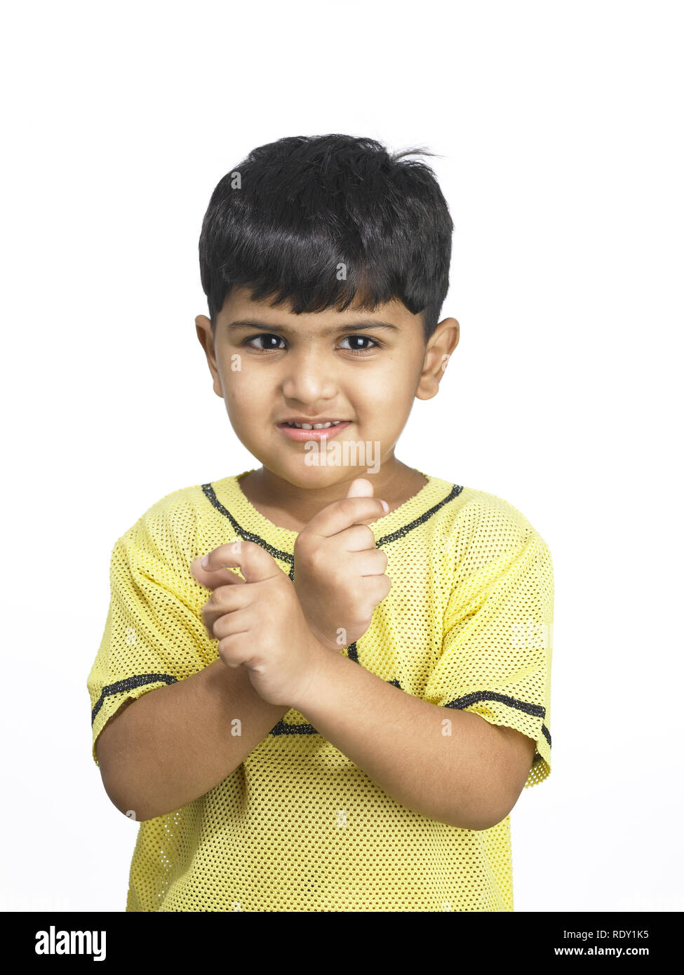 PORTRAIT OF A YOUNG BOY TRYING TO SNAP HIS FINGERS Stock Photo Alamy