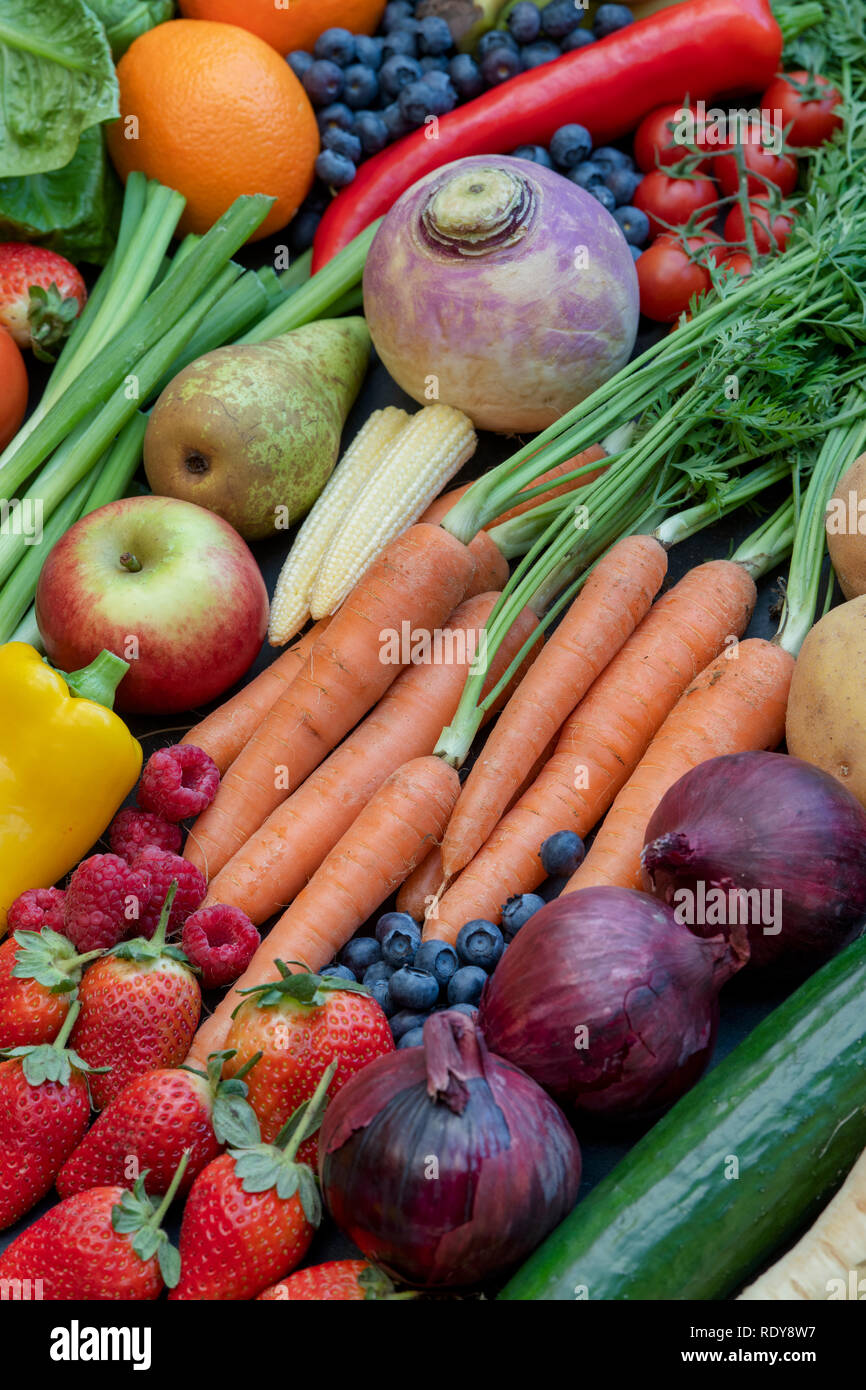 Fruit and vegetables on slate Stock Photo Alamy