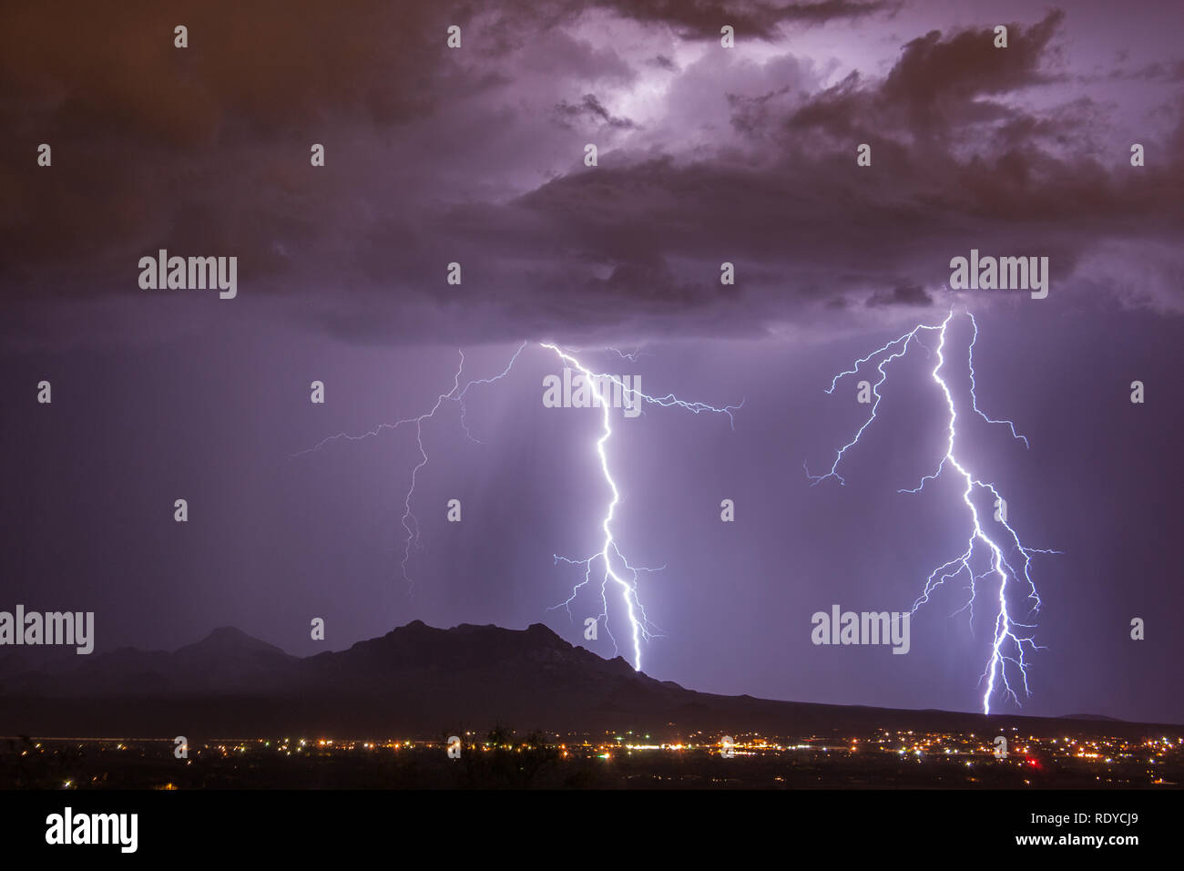 Cloud to Ground Lightning Strikes Behind the Dona Ana Mountains in Las