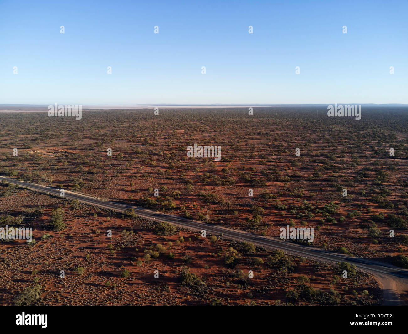 Aerial of the Stuart Highway as it passes through the arid environment of southern South Australia Stock Photo