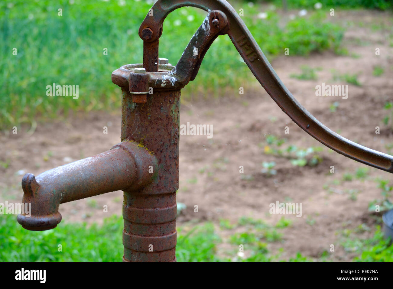 Old rusty water pump Stock Photo Alamy