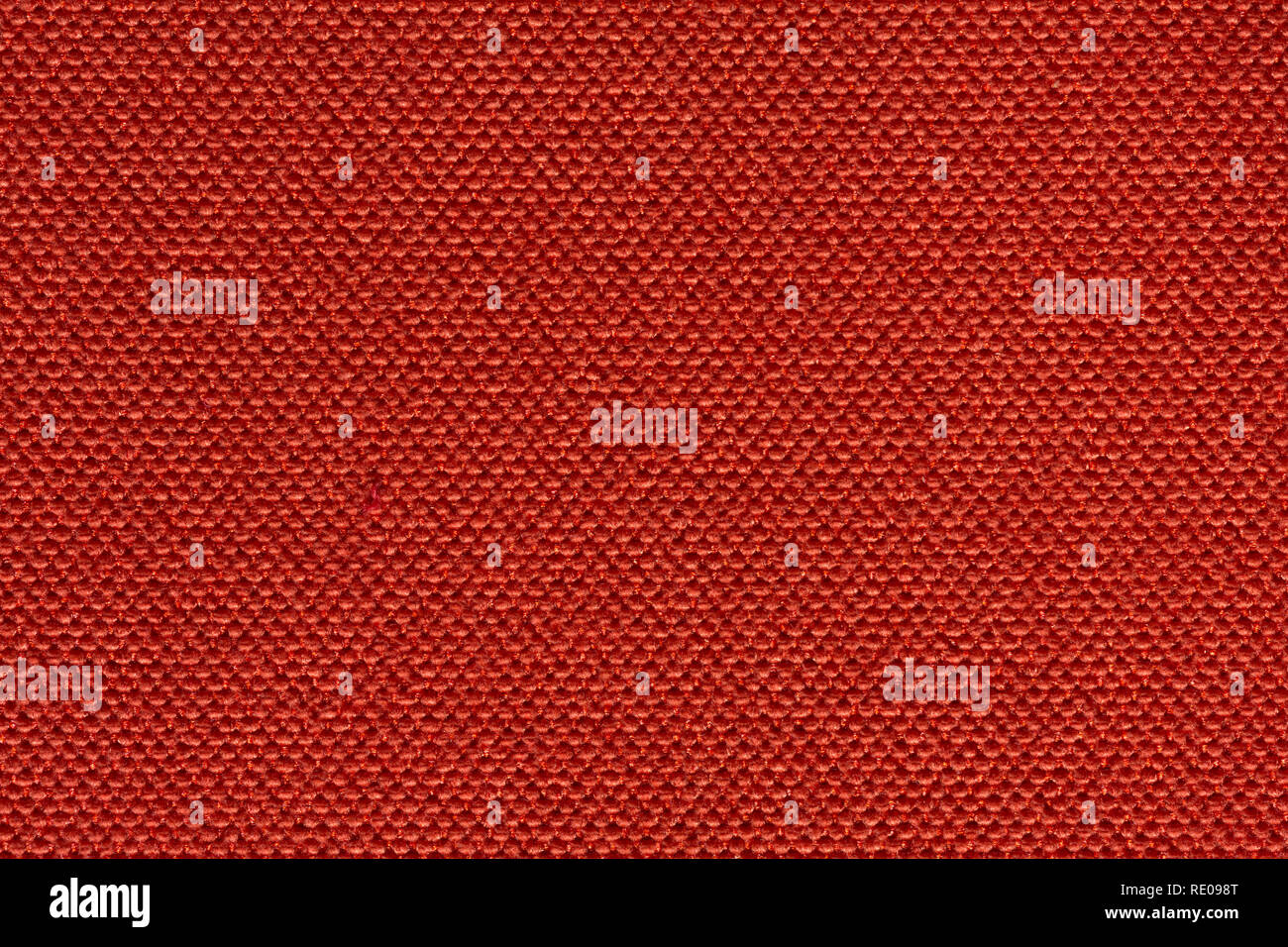 New material texture in your admirable lush red colour. Stock Photo