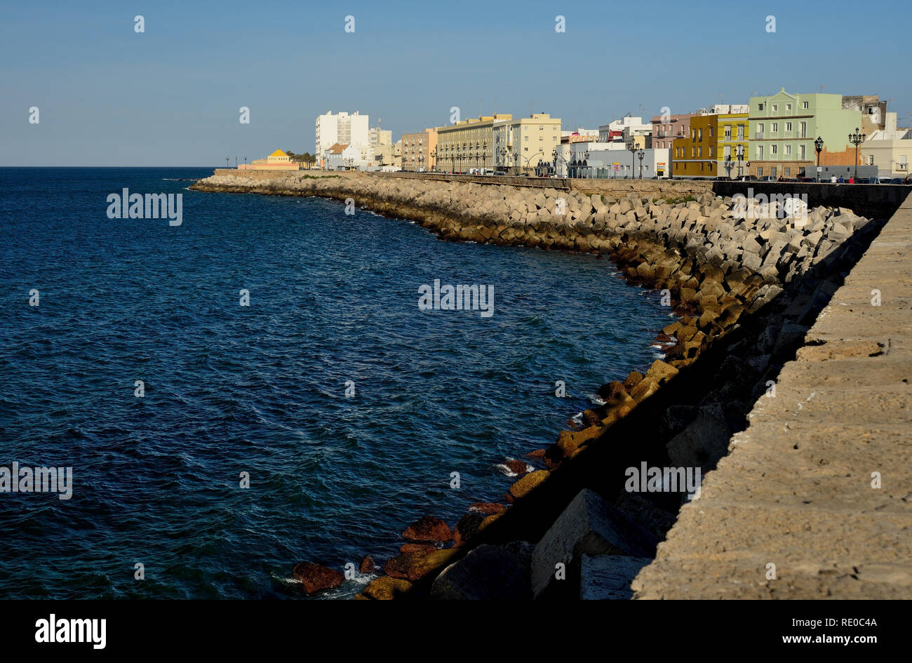 Rock armour protecting the seawall along the Campo del Sur, Cadiz. Stock Photo