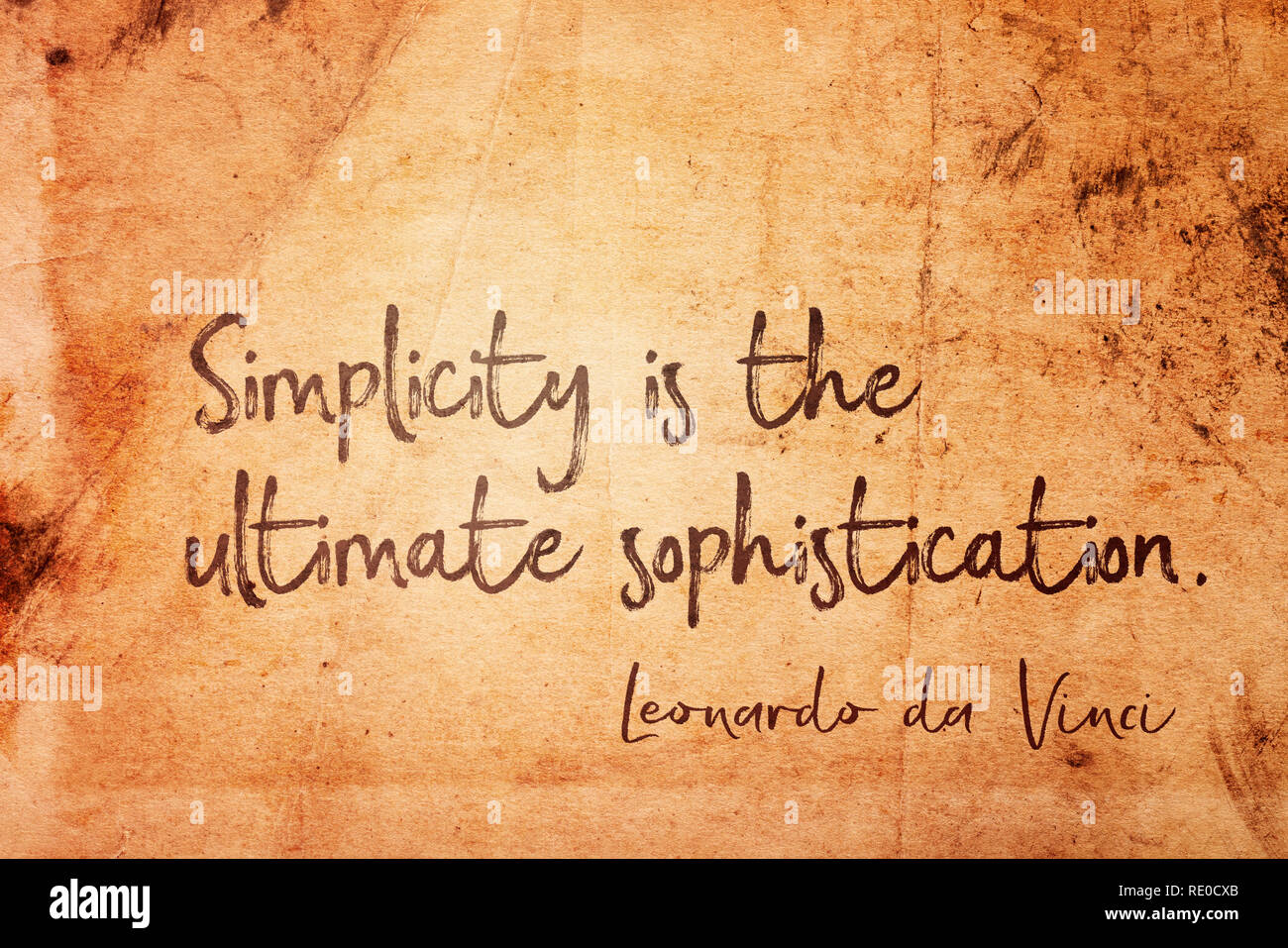 Simplicity is the ultimate sophistication - ancient Italian artist Leonardo da Vinci quote printed on vintage grunge paper Stock Photo