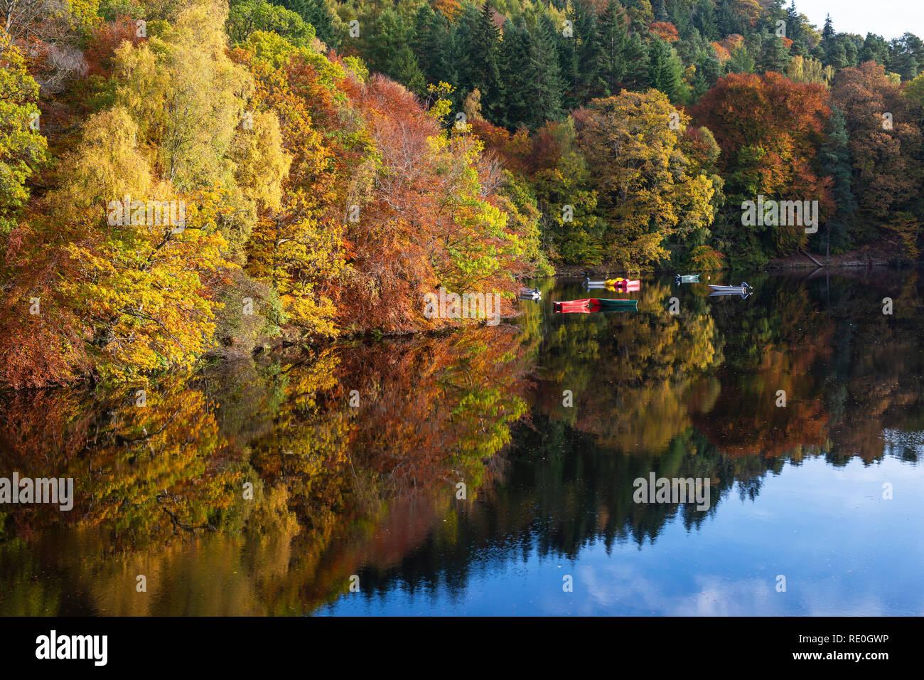 Colourful boats on Loch Faskally near Pitlochry, Perthshire, Scotland Stock Photo