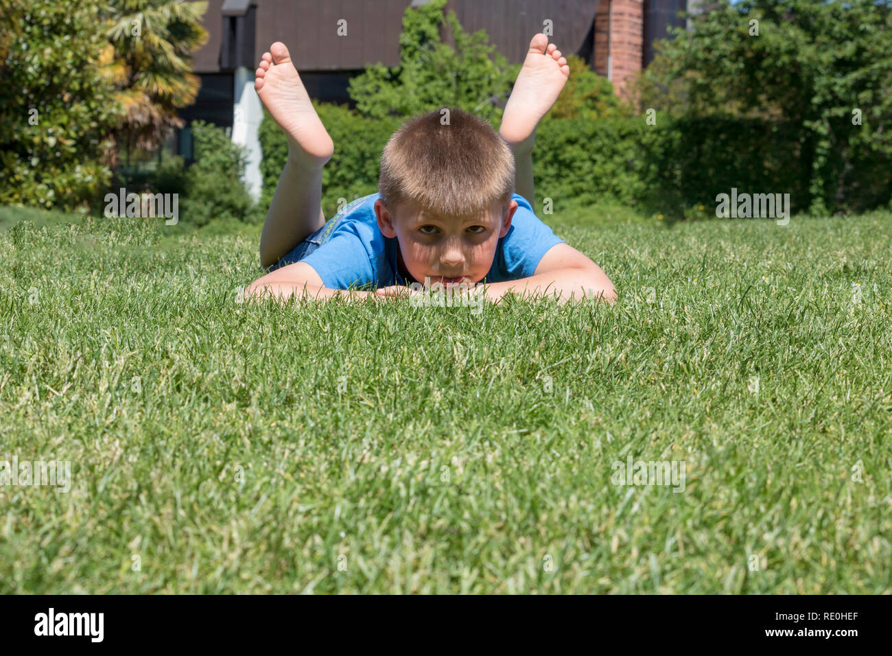 Portrait of a happy little boy in the park Stock Photo - Alamy