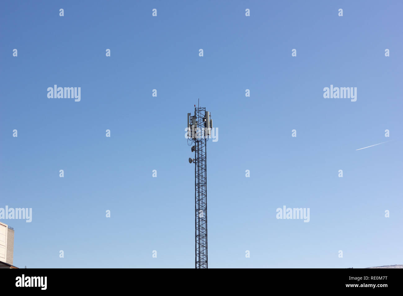 A mobile (or cellular) phone base transceiver station antenna array at Urmia, West Azerbaijan province, Iran Stock Photo
