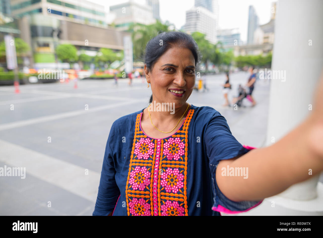 Personal point view of mature Indian woman taking selfie Stock Photo